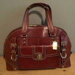 Coach leather handbag. Barely used. Burgundy colour.